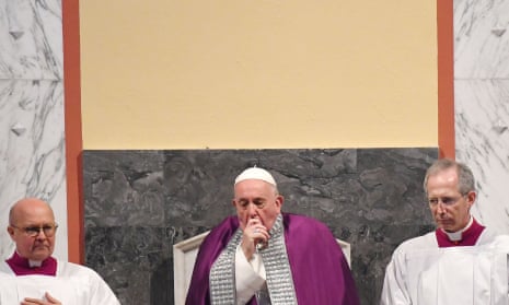 Pope Francis at the Ash Wednesday mass, where he appeared to be suffering from a cold. He was seen blowing his nose and coughing during the service, and his voice sounded hoarse