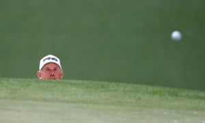 Lee Westwood watches his chip onto the 7th green