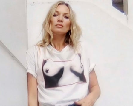 Kate Moss wearing a charity T-shirt featuring Westwood and Malcolm McLaren’s 1975 “tits” design