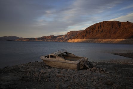 A formerly sunken boat sits high and dry along the shoreline of Lake Mead in May.
