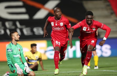 Nestory Irankunda celebrates pinch Mohamed Touré aft scoring for Adelaide United successful 2022.