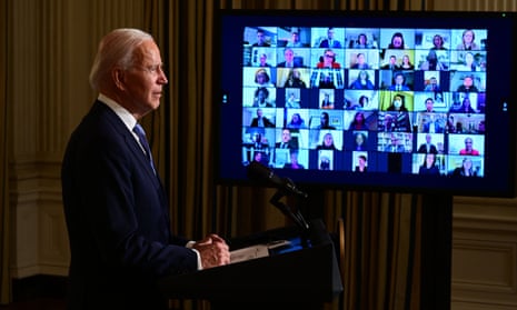 Joe Biden swears in presidential appointees during a virtual ceremony in the Oval Office.