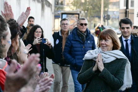 Gisèle Pelicot followed by her lawyer lawyer Stephane Babonneau, right, is congratulated by women outside the Avignon courthouse after the prosecution concluded its case in November 2024.