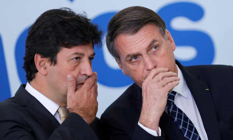 Jair Bolsonaro, right, with Luiz Henrique Mandetta, whom he has fired as health minister