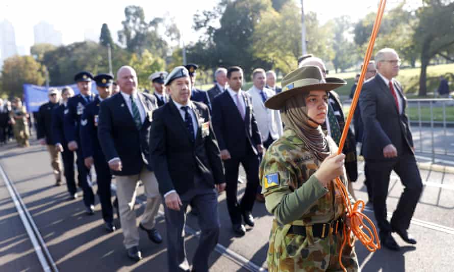 People in the Multiple National Forces Iraq 2003- 2009 are seen in the march parade during Anzac Day in Melbourne, Monday, April 25, 2022. AAP Image/Con Chronis)
