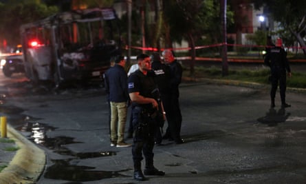The burned wreckage of a bus set alight by the Jalisco New Generation cartel in Zapopan in Jalisco state last year.