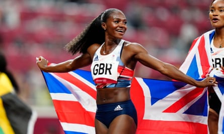 Dina Asher-Smith celebrates after winning bronze in 4x100m relay at the Tokyo Olympics.