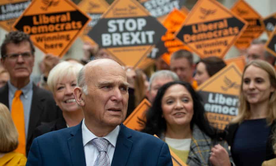 The Liberal Democrats leader, Vince Cable, with activists in Chelmsford.