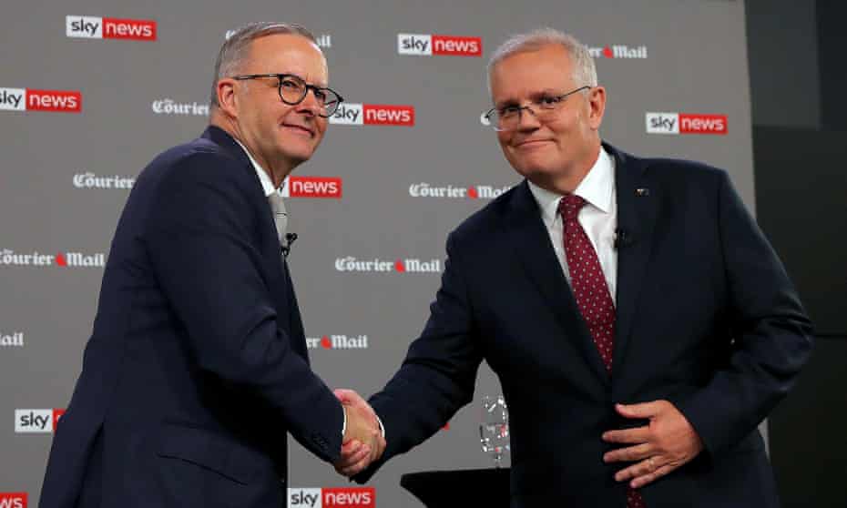 Australian Opposition Leader Anthony Albanese (left) shakes hands with Australian Prime Minister Scott Morrison during the first leaders' debate of the 2022 federal election hosted by Sky News at the Gabba in Brisbane, Wednesday, April 20, 2022.
