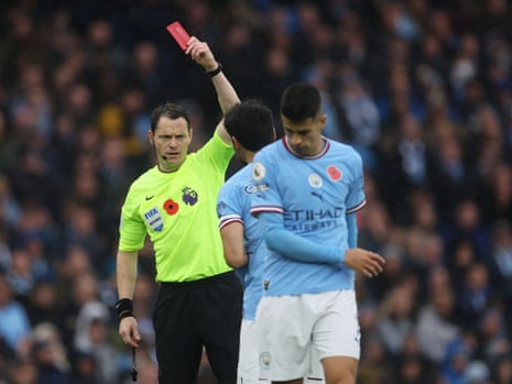 Joao Cancelo is shown a red card.