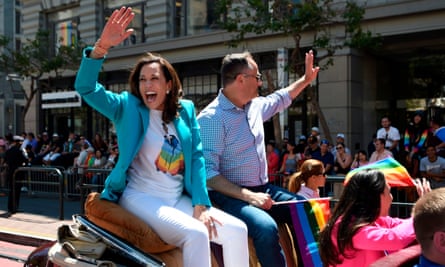 Kamala Harris waves to a cheering crowd during the San Francisco gay pride parade.