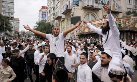 Ultra-Orthodox Jewish pilgrims dance ahead of Rosh Hashanah in Uman, central Ukraine, on Friday