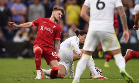 Liverpool’s Harvey Elliott suffers a fractured ankle in a tackle by Leeds’ Pascal Struijk, who was sent off.