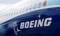 FILE PHOTO: The Boeing logo is seen on the side of a Boeing 737 MAX at the Farnborough International Airshow, in Farnborough, Britain, July 20, 2022. REUTERS/Peter Cziborra/File Photo/File Photo