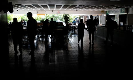 People at a shopping mall during a blackout in Caracas, Venezuela, on Thursday.