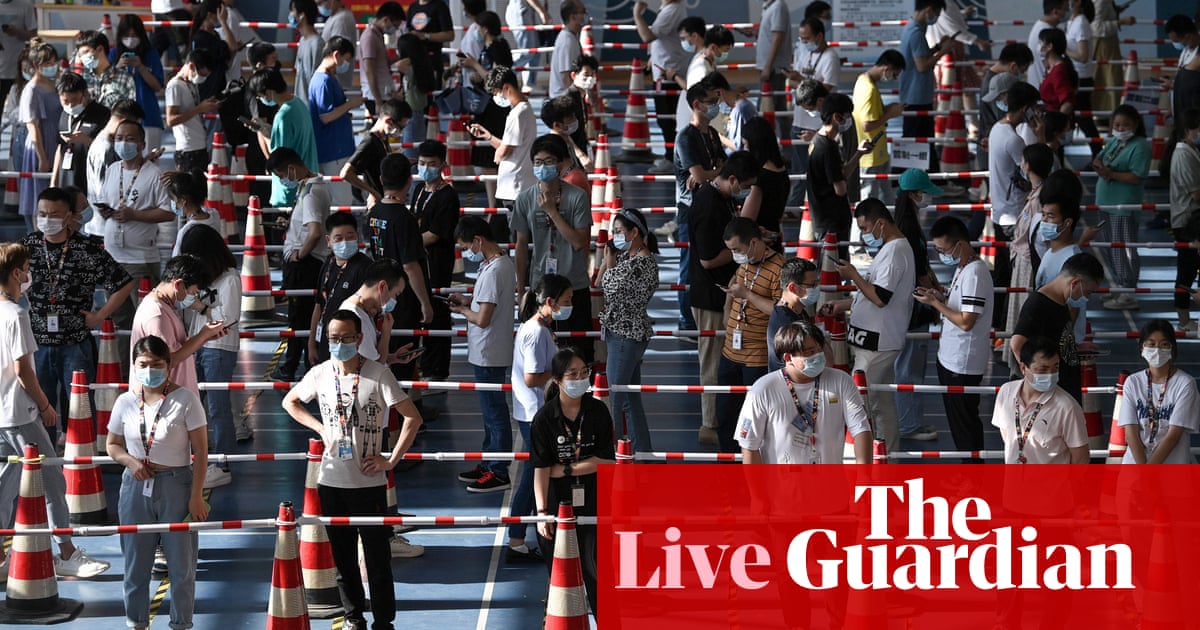 Coronavirus live news: China cases surge; Gibraltar reports first Covid death since March