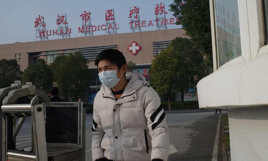 A man leaves the Wuhan Medical Treatment Centre