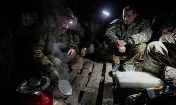 Ukrainian servicemen at a front line near the town of Chasiv Yar.