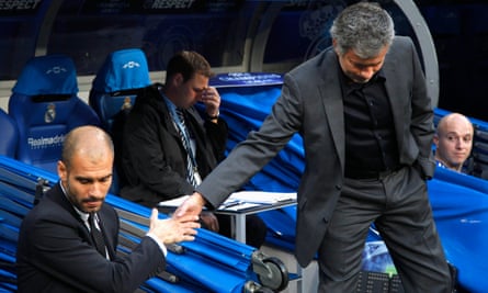 José Mourinho (right) shakes hands with Pep Guardiola before the Champions League semi-final first leg match between Real Madrid and Barcelona, in 2011.