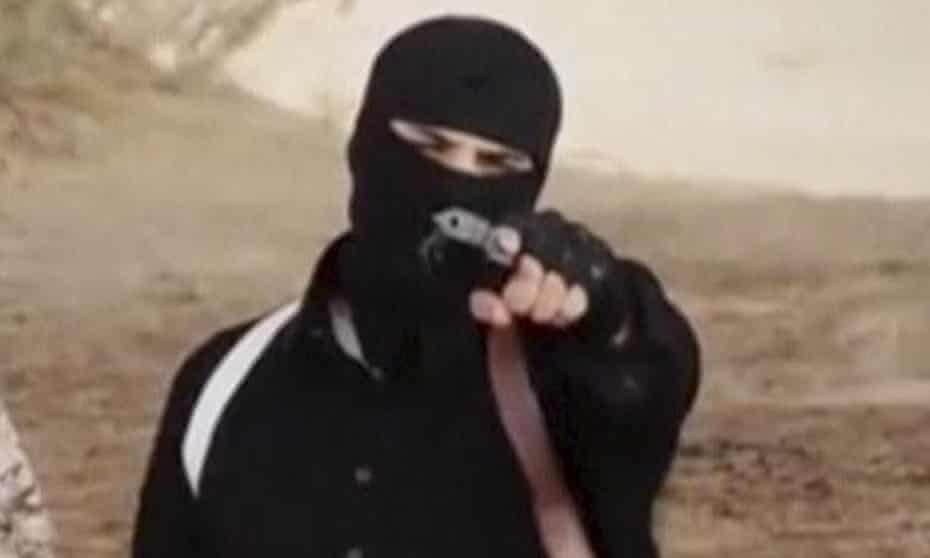 An Islamic State militant holds a gun in a still from the latest Isis video.