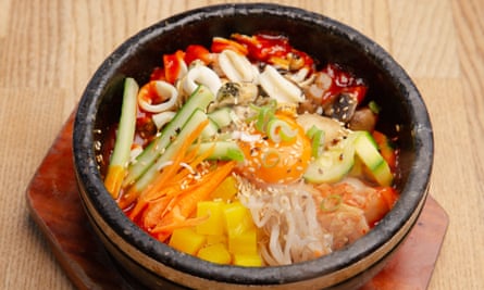 ‘A furiously hot iron pot’: seafood bibimbap.
