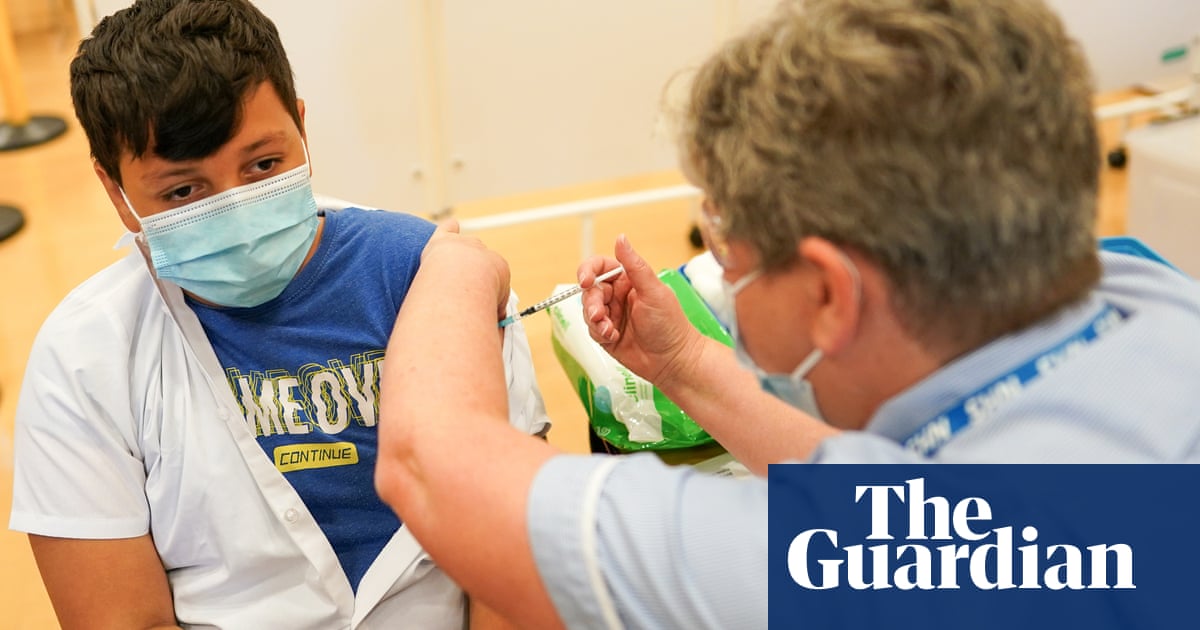 England urged to step up vaccinations to avoid winter Covid surge