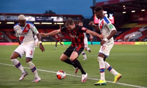 Bournemouth’s Jack Stacey battles for the ball with Crystal Palace’s Patrick van Aanholt (left)l and Wilfried Zaha.