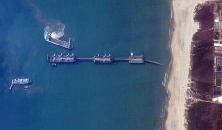 A satellite image taken in March 2025 showing three Chinese barges connected via extendable bridges in waters off Zhanjiang city, in southern China’s Guangdong province