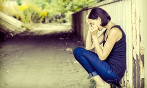 Sad woman in the street