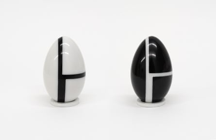 Two black and white marble egg sculptures.