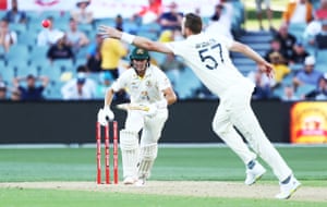 Australia’s Marnus Labuschagne drives a delivery past England’s Ollie Robinson.