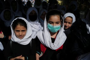 Hadia (Centre), 10, a 4th grade primary school student, leaves school after a class in Kabul. “I’m in the 4th grade. I want to be a doctor, but if in two years’ time I am not be allowed to continue my studies like my sister, I won’t be able to fulfil my dream,” said Hadia. “That already scares me.”