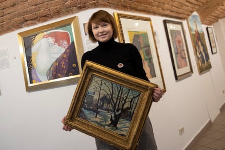 Co-owner of the Vienna Museum of Art Fakes Diana Grobe with a Tom Keating work painted after the French impressionist Jean Puy.