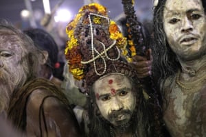 Sadhus cover themselves in ash for the event.