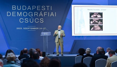 a man speaking on a stage