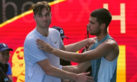 Draper retires injured as Alcaraz sets up Australian Open quarter-final with Djokovic | Australian Open | The Guardian