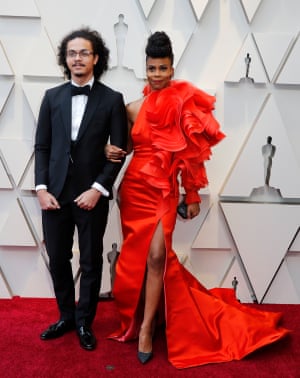 Hannah Beachler made history by becoming the first black person to win a gong for production design – and what a dress she had for the occasion. The alternative to the frothy pink dress trend? A frothy red dress – but with Wakanda-inspired face jewellery