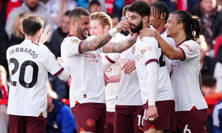 Josko Gvardiol receives congratulations after giving Manchester City the lead.