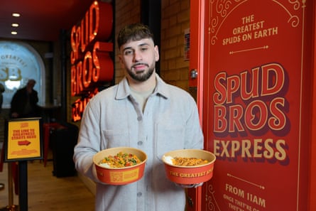 Guardian writer Sammy Gecsoyler with a SpudBros takeaway.