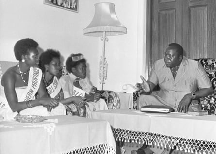 Miss Tourism girls visit Amin at State House in 1978.