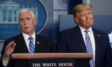 Donald Trump with Mike Pence, the leader of Trump’s coronavirus taskforce. More than 46,000 people in the US have been diagnosed with Covid-19 and nearly 600 have died.