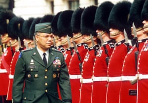 Powell inspects a guard of honour in London in 1993