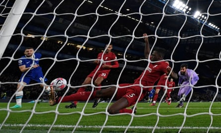 Ibrahima Konaté clears a Chelsea shot off the line
