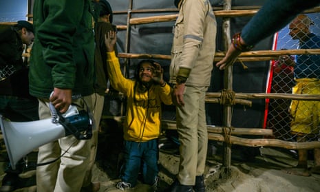 INDIA-RELIGION-HINDUISM-FESTIVAL-KUMBHPolice personnel rescue a victim of stampede amid the ongoing Maha Kumbh Mela festival in Prayagraj on January 29, 2025. (Photo by ARUN SANKAR / AFP) (Photo by ARUN SANKAR/AFP via Getty Images)