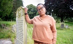 The poet Zakiya Mckenzie at the memorial to the enslaved people who died in a fire at a Baptist church in Bristol and were denied a proper burial until 1926.