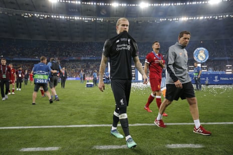 Liverpool goalkeeper Louis Karius looks distraught as he leaves the pitch.