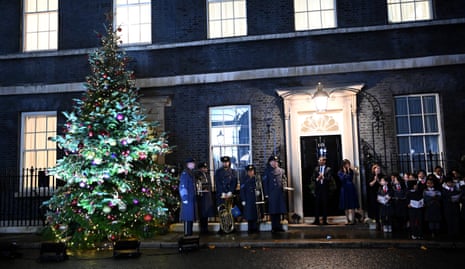 Rishi Sunak switching on the Downing Street Christmas tree lights.