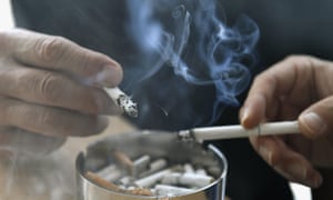 People smoking cigarettes.