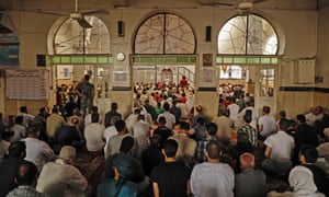 Syrians attend Eid prayers at a mosque in the city of Idlib