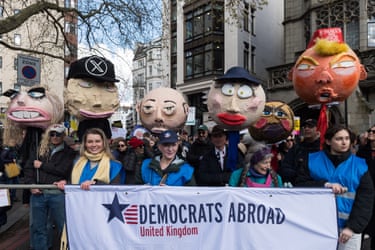 London, UKDemocrats Abroad demonstrators hold paper mache heads depicting US Attorney General Bondi, Musk, US Homeland Security Advisor Miller, Noem, US Vice President JD Vance and US President Trump during a protest Donald Trump administration’s immigration enforcement tactics and the war in Iran ahead of Together Alliance Against the Far Right March